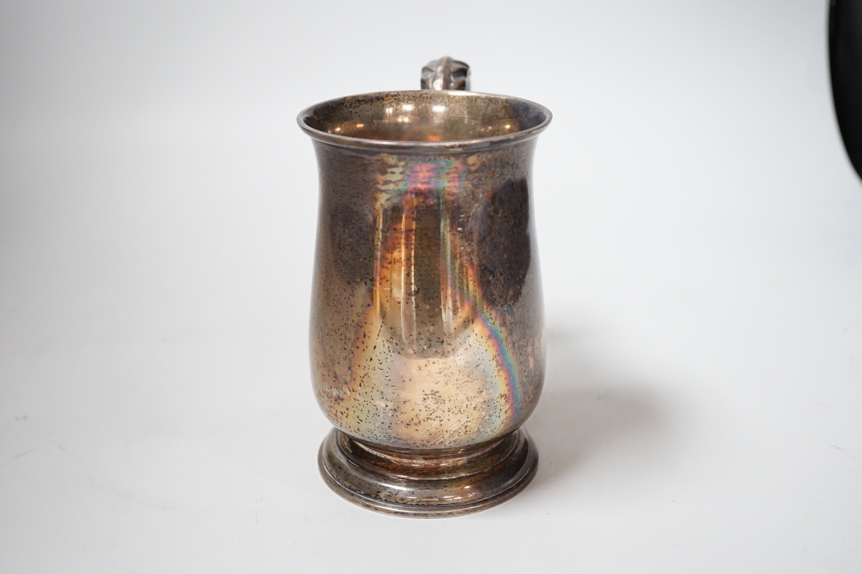 A George V silver baluster mug, Bravingtons Ltd, London, 1935, height 14cm, 10.1oz.